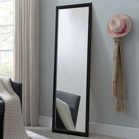 【Full Size】: 71"x31" Large full length dressing mirror enough for you to see your full body. Expand the visual space of the room. 【Shatterproof Glass & Wood Frame】: The door mirror use scatter-proof and shatter-proof glass, safer, more reassuring. The frame is made of wood, and the corners of the frame are fixed by solid metal screws.