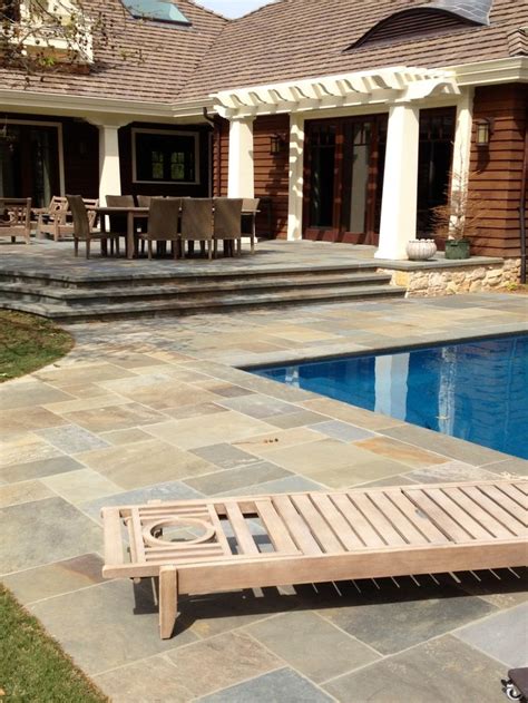 Full range bluestone in ashlar pattern and pool coping. Provided by