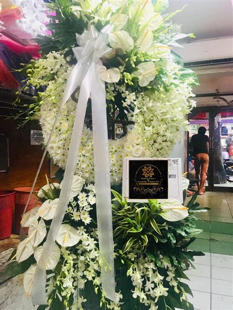 Funeral flowers dangwa.  Send condolence flowers to represent your prayer...
