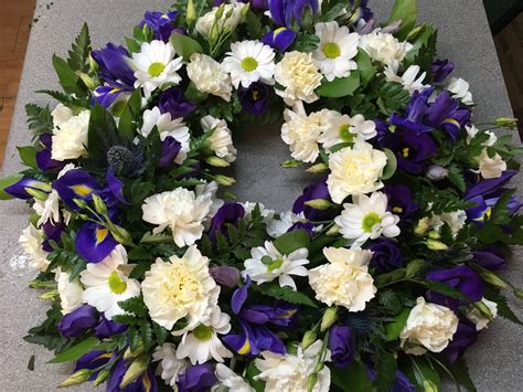 Funeral flowers wreath.  Funeral.  Consider having flowers delivered to th...