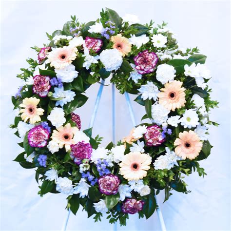 Funeral flowers wreath.  We have many years of experience creating funer...