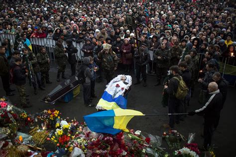 Funeral held for victims of Russian market attack amid more strikes, as Blinken visits Ukraine