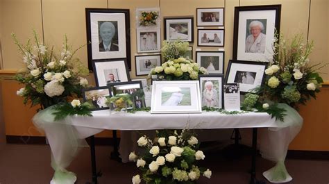 Funeral memory table ideas.  By incorporating different elements into a funeral Ch...