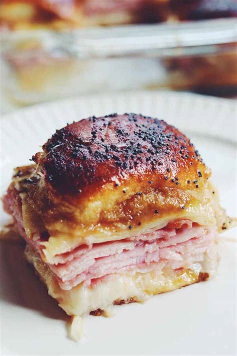 Funeral.sandwiches. Sep 27, 2016 · Place 1 1/2 slices of ham on each roll. Place the top half on the bottom half and place the entire thing into the pan. Melt the butter and whisk in the poppy seeds, dehydrated onion, and mustard. Spread it evenly over the rolls. Cover with aluminum foil and bake for about 20 minutes or until the cheese is melted. 