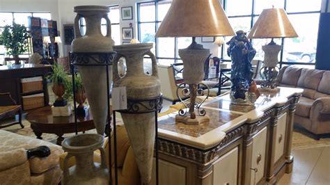 Contact Us Phone: 239-593-6879 Email: Consign@surroundingsfla.com Showroom Hours: Monday-Saturday 10AM - 5PM Address: 12980 Tamiami Trail N Naples FL 34110. 