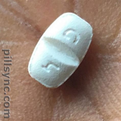 145 Pill - white capsule/oblong, 17mm . Pill with imp