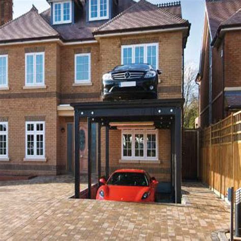 Garage to Basement Car Lift by Total Lifting Solutions (TLS) - balustradellc