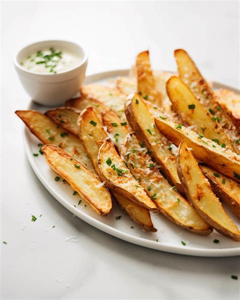Garlic Parmesan Potato Wedges - balustradellc