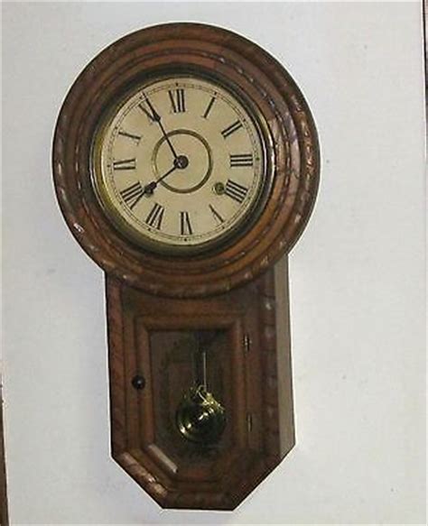 GILBERT LONG DROP WALL CLOCK w/CYLINDRICAL PENDULUM