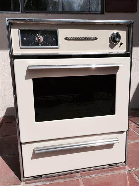 1950's White Gaffers and Sattler 40" stove. Model#3694 40" stove in good condition with four burners. Right side oven, left side broiler, storage drawer and right side 2nd broiler access, clock, cook light, timer. Needs a cleaning and new door spring due to hyper-extension. 2/17/15 assessed at $500.$700.. 