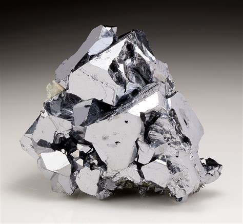 Galena forms in low- and medium-temperature ore veins, along with other sulfide minerals, carbonate minerals, and quartz. These can be found in igneous or sedimentary rocks. It often contains silver as an impurity, and silver is an important byproduct of the lead industry.. 