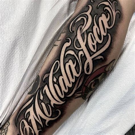 Gangster font tattoo. 1. The Krakens Best Gangster font overall (editor's choice) Image credits: Envato Elements. Immerse in the alluring appeal of The Krakens. It's a font that perfectly captures the essence of the gangster aesthetic with its bold block letters and undeniable charisma. 