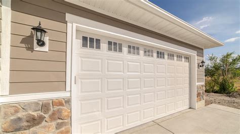 Garage door cost and installation. A garage costs $27,500 on average to build and $13,000 to convert or renovate. Driveway installation averages almost $4,500.Garage doors average $1,100 to install and around $250 to repair. Check below for other popular garage project costs including epoxy coating, organizing and carport prices. 