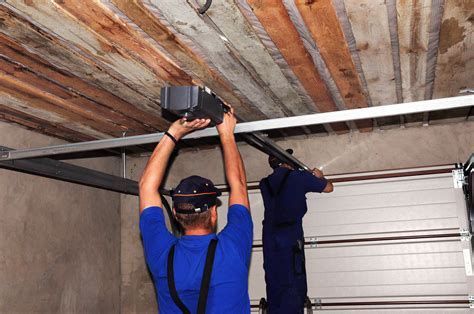 Garage door servicing. Labor: Paying a professional installer usually costs $200–$500 per door. That doesn’t include running electricity for the automatic opener. Manual vs. automatic: Installing a manual garage door costs anywhere from $600–$2,150. … 