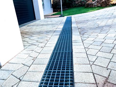 Garage drain. Sep 16, 2019 · Make sure the tube slopes to drain the water. Check the drainage tubing with a 4-ft. level to make sure you have at least 1/8 in. of slope per foot of tubing (1/2 in. every 4 ft.). Adjust the gravel base as needed. Overlap the sock ends after you connect them. How to Unclog a Toilet. 