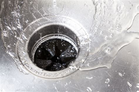 Garbage disposal clogged. If the smells come from disposal water coming back up the sink, then the issue may be a clogged disposal drain. You may also have a clogged disposal drain line if the unit isn’t draining liquids. Either way, there’s a blockage in the disposal system which a drain cleaning expert can fix for you. 3. 