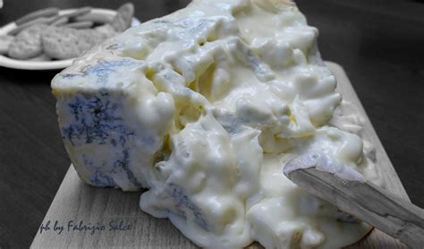 Gargonzola. Jul 23, 2023 · Gorgonzola cheese is a soft, white cheese that originated in Italy. It is made from unskimmed cow ‘s milk and has a crumbly, dry texture. It is typically aged for six months and has a nutty, buttery flavor. Blue cheese, on the other hand, is a semi-soft to hard cheese that originated in France. 