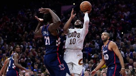 Garland leads shorthanded Cavaliers to 122-119 win over 76ers in overtime