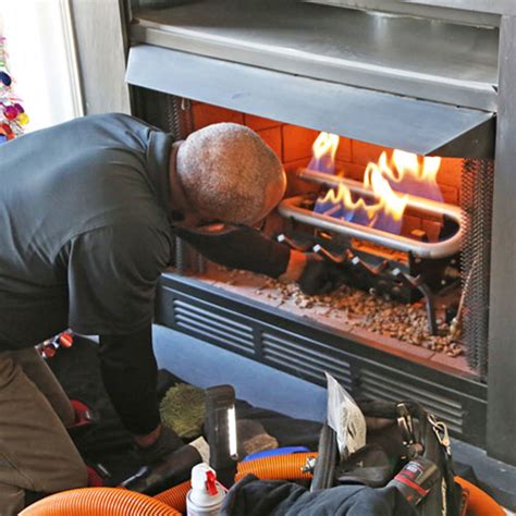 Gas fireplace cleaning. Clean the Firebox. Place a large tarp on the floor in front of the fireplace (Image 1). Discard any leftover wood and take out the grate (Image 2). Scoop out the leftover ashes with a fireplace shovel, then remove any excess with a small handheld broom and dustpan (Image 3). Keep a small bucket nearby for easy disposal. 