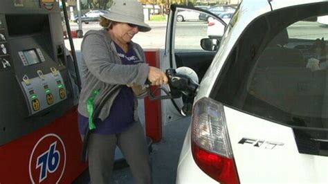 Gas prices dip in time for holiday travel rush