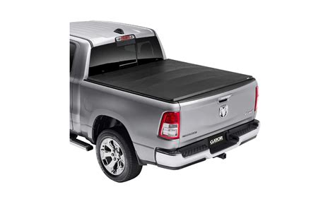 The Gator ETX Soft Tri-Fold provides convenient protection for your truck bed and its cargo at an affordable price. This soft fold truck bed cover can be installed in less than 10 minutes without the use of special tools, and without having to drill into your truck bed. Simply clamp the rails onto the truck bed and you’re ready to go.. Gator etx soft tri-fold installation