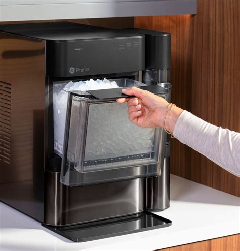 Opal Ice Maker Dispenser - Defrost Issues. Your Opal Ice Maker Dispenser will defrost when it is needed. When your Opal needs defrosting, it may start to squeak as ice begins to build up around the mechanisms. The defrost cycle is automatic and usually takes about 10 to 20 minutes. This is normal operation.. 