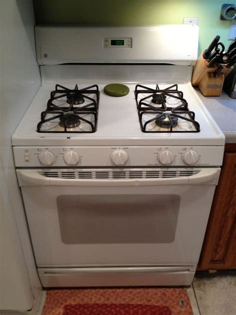 GE Spectra xl44 gas range-My oven won't turn on even though the broiler and top burners work fine. I followed the manual to check the shut-off valve behind the warming drawer , and it appears the tiny red switch fell off.. 