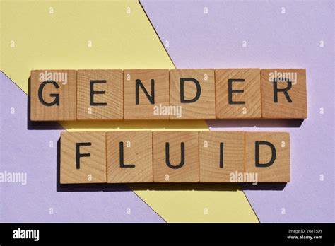 Gender Fluid, words in wooden alphabet letters isolated on background