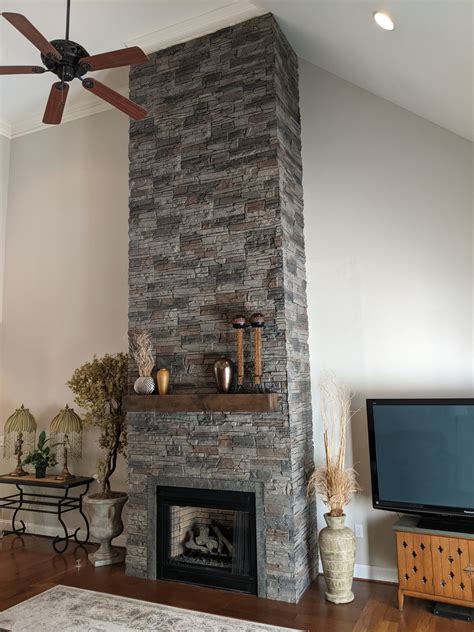 Genstone cost. Stacked Stone Panels by Genstone. Measuring 42″ wide and 12″ tall, the GenStone stacked stone panel features a 1″ shiplap edge along the top and right side of the panel making attaching the next panel not only seamless but also watertight. Each panel is cast from real stone into 4 unique molds to eliminate repetition. 
