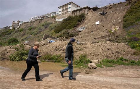 Geologists checking hillsides threatening Southern California apartment buildings as more rain falls