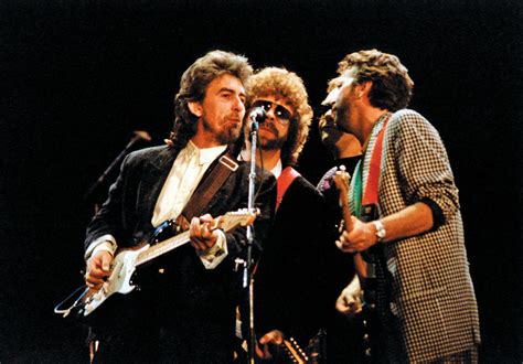 George Harrison, Eric Clapton and Ring Starr - DireStraits