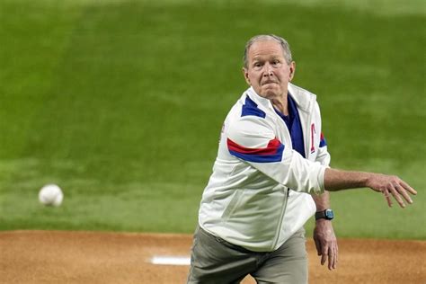 George W. Bush has a little bounce as he throws ceremonial first pitch to start World Series