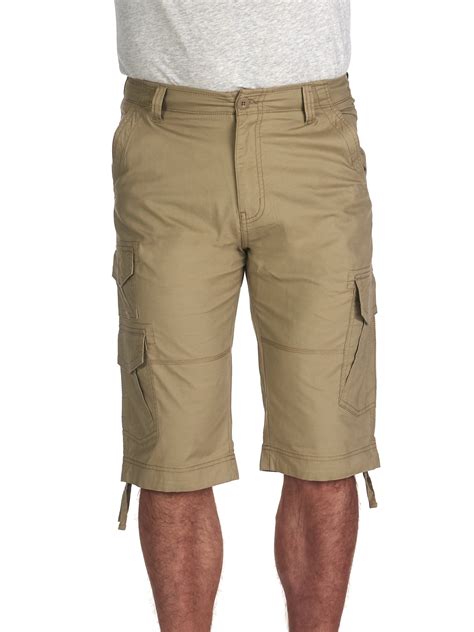 George cargo shorts. Size: Model is 6'1" and is wearing a size M. Fit: Relaxed. Rise and Inseam: Mid-rise; hits above the knee. Closure: Pull-on with drawstring elastic waist. Pockets: 2 front slash pockets, 2 back flap pockets and 2 back flap pockets hold essentials. Features: Lightweight woven fabric. Men's and Big Men's Pull On Cargo Shorts from George. 