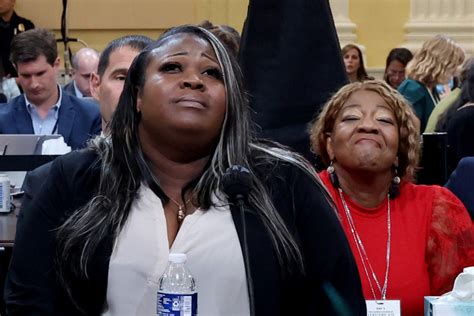Georgia election worker tearfully describes fleeing her home after Giuliani’s false claims of fraud