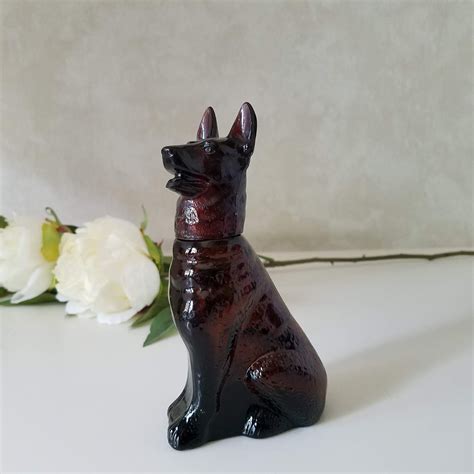 German shepherd avon bottle. The king shepherd is larger and heavier, and its coat has a different texture from the German shepherd. The German shepherd is a pure breed that is recognized by the American Kenne... 