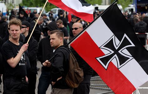 Germany bans neo-Nazi group with links to US, conducts raids in 10 German states