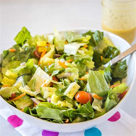 Get your salad tossed. Directions. In a salad dressing cruet, add all dressing ingredients and shake well to combine. Add all salad ingredients to a large bowl and toss to combine. Add desired amount of dressing to salad and toss just before serving. 