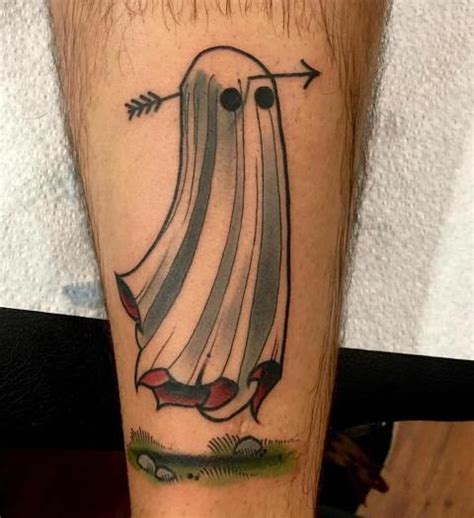 Ghost with legs tattoo. A small ghost tattoo is a tattoo of a small, cartoon-like ghost. These tattoos are usually seen on the arms, legs, or back of people who enjoy Halloween and all things spooky. Small ghost tattoos are often chosen as a first tattoo because they are simple and easy to cover up if needed. 
