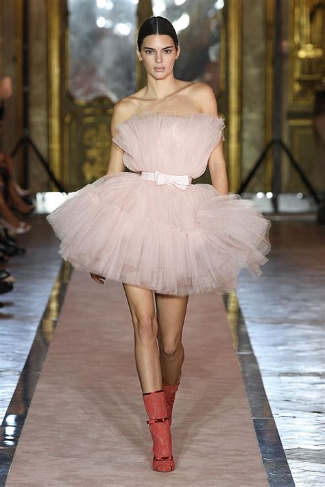 Giambattista valli. 5 July 2021. Giambattista Valli shot his autumn/winter 2021 haute couture collection in the brutalist former headquarters of the communist party in Paris. Here, his pastel-coloured tulle dreams cut a surreal contrast to … 
