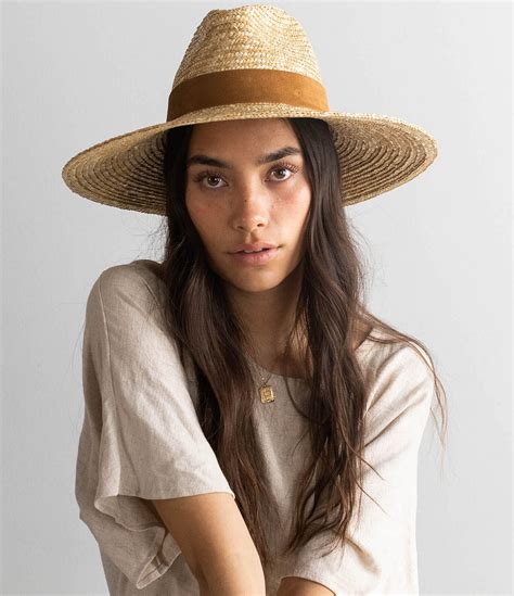 Gigi pip. XS 55. S/M 57. M/L 59. XL 61. Add to Cart. Shop Confidently. If you need an exchange to get the right fit or hat, we'll cover the shipping!*. Dahlia is the underrated hat of the century. This silhouette features a boater-style crown + a stiff flat brim that's not too long or too short, making it an approachable vibe. 