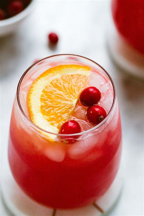 Gin drink recipes. This gin and orange juice cocktail is super simple and only requires THREE base ingredients: Orange juice, gin, and tonic water. It's as simple as combining all the ingredients into a cocktail glass with a quick stir. Fill a glass with ice cubes. Then add the orange juice, tonic water, and gin. Garnish with pomegranate seeds, a slice of orange ... 