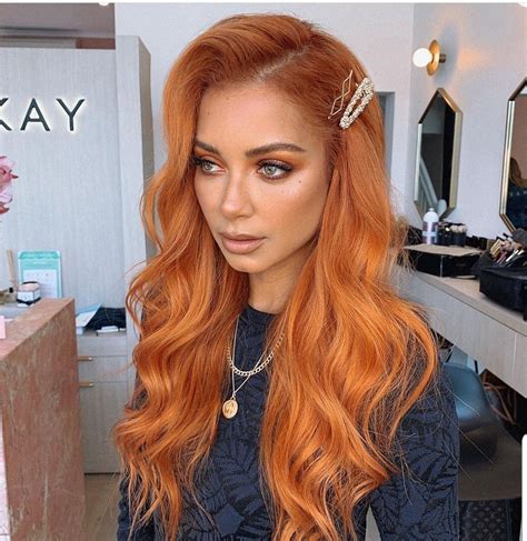 7. Highlighted Ginger Waves. Rock ginger waves with this chic hair look. Take chunky strands and add blonde highlights to them. This hairstyle gives a beautiful sun-kissed two-toned look without much effort. Whether the strands are left loose or tied up, this hair look will look equally stunning. 8..