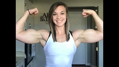 Girl Big Bicep, World fitness Biceps FBB showing huge Muscles.