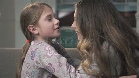 Girls rub their tits together.  Download young girls enjoy each other'...