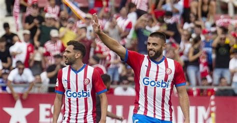 Girona beats Mallorca 5-3 to take provisional lead of Spanish league