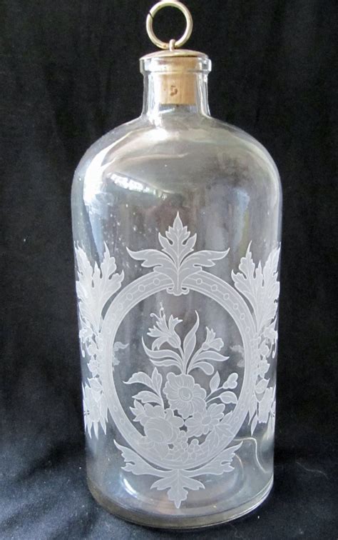 Glass bottle with etched flower design and stopper eBay