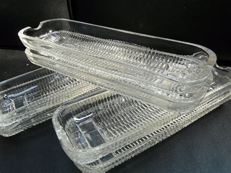 Glass corn cob dishes. Add to Favorites. Vintage Pressed Clear Glass Corn on the Cob Plates/Dishes/Holders, Set of 2. (73) $16.99. Add to Favorites. Set of 4 Ravenhead Flair or Cascade glass corn on the cob dishes, retro corn on the cob dishes, sweetcorn glass serving dishes. (710) $29.43. 