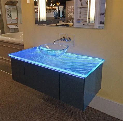 Glass panel built into the countertop, next to the sink.