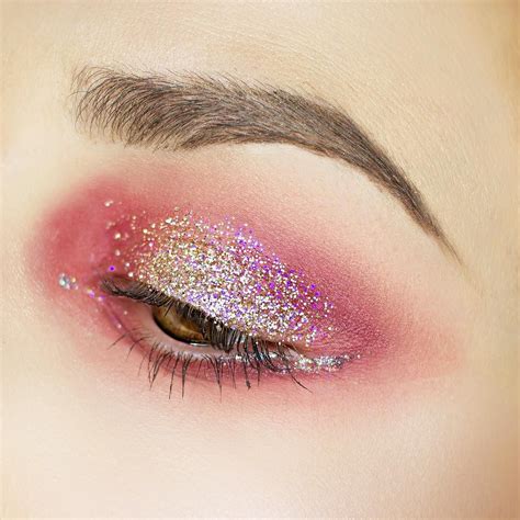 Glitter makeup eye. Everyone does makeup differently. For some, applying makeup can be as simple as a light touch of eyeliner or applying some blush to the cheeks. For others, nothing but the full exp... 