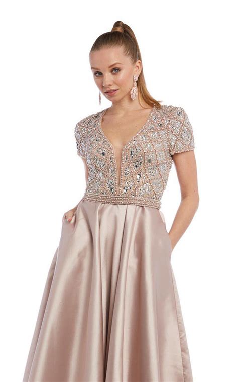 Glitz and gowns. 51. 53. 55. Glitz & Gowns located at Alabaster, AL offering a huge selection of bridesmaids, prom, pageant dresses, tuxedos, and party dresses. Book an appointment and come browse our gorgeous collection of designer formal dresses. 